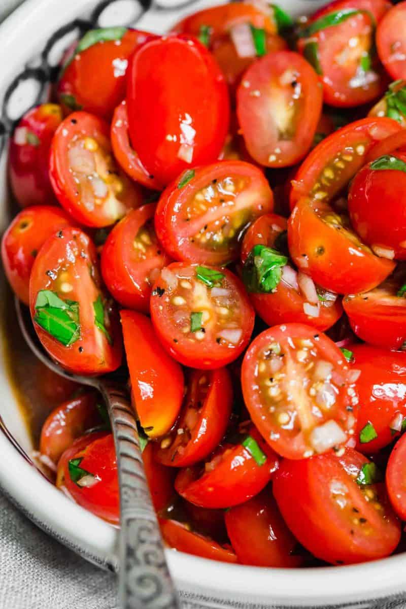 This is the best summer tomato salad! With a short ingredient list, this fresh salad will have you making it all summer long!