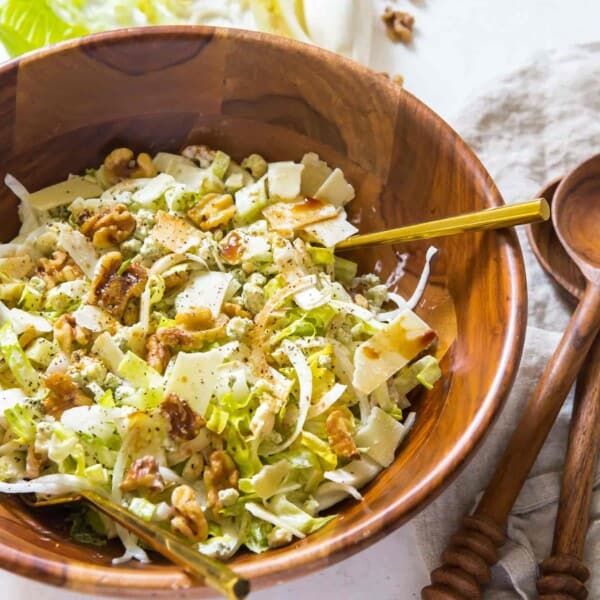 Inspired by my trip to Southern France, this incredibly refreshing chopped endive and romaine salad will be one of your new favorite salads to make! You'll love all the flavors and textures of this salad! #endive #romaine #choppedsalad #saladrecipe #refreshingsalad