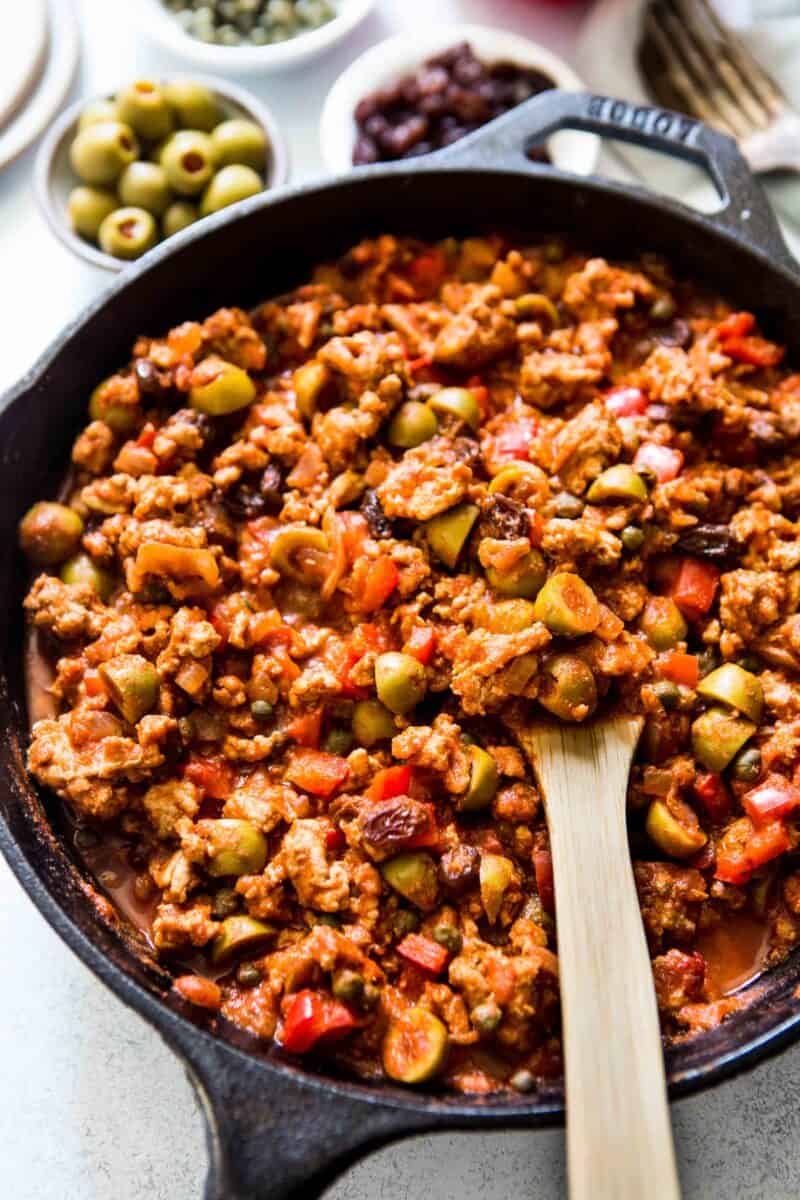 This turkey picadillo recipe is a quick and flavorful weeknight meal! Full of salty, briny, and sweet flavors!