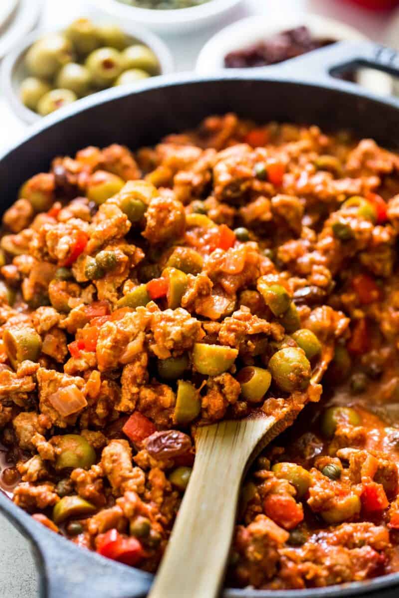 This turkey picadillo recipe is a quick and flavorful weeknight meal! Full of salty, briny, and sweet flavors!