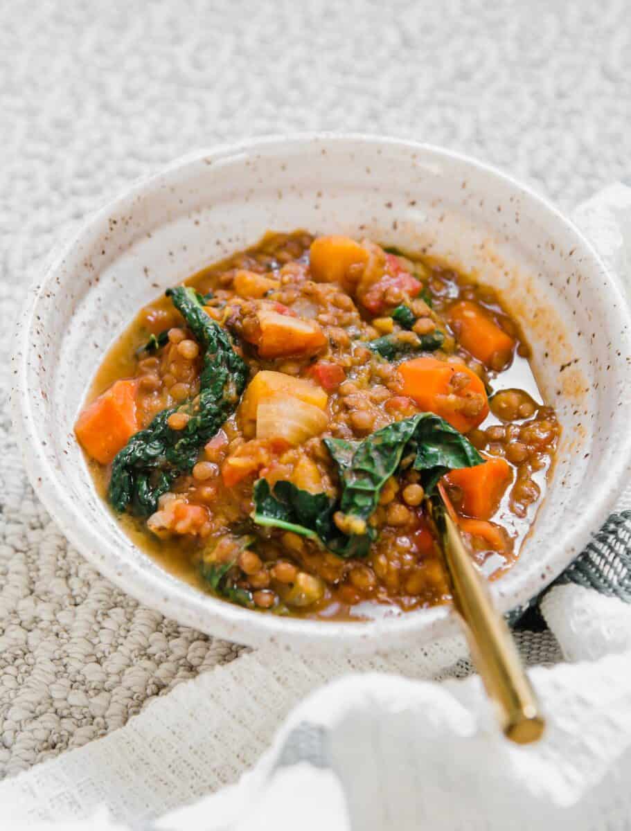 A quick lentil soup made in the Instant Pot and loaded with veggies for a deliciously cozy soup for any time of year!