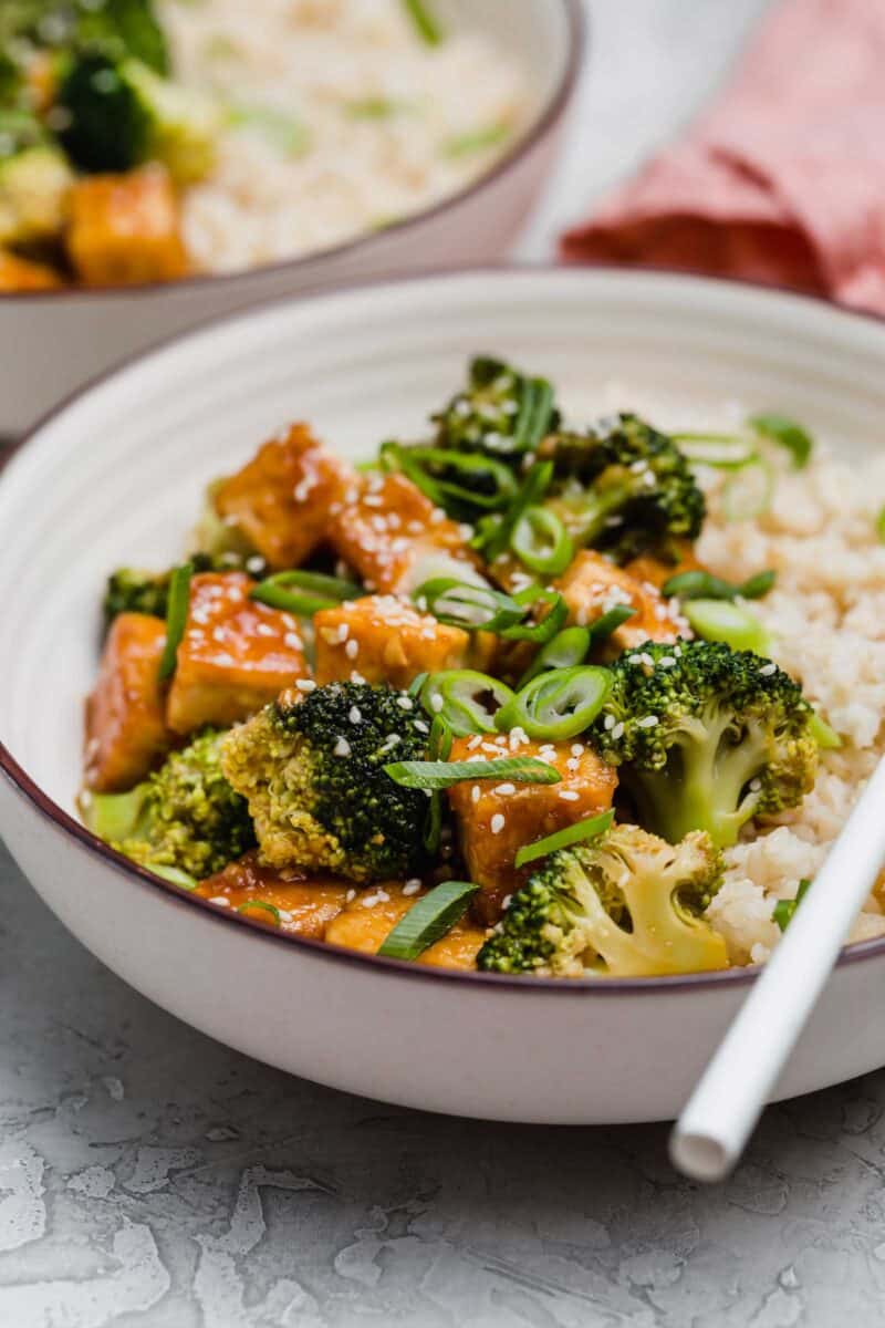 Teriyaki tofu and broccoli bowls are a great plant-based dinner idea for any night of the week! The flavors are bold and you won't miss the meat!