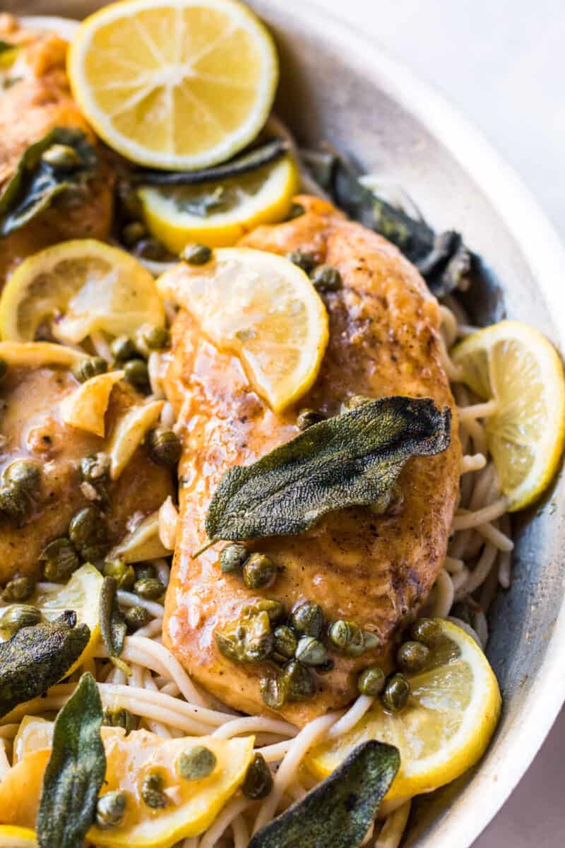 This easy chicken piccata is elevated with a crispy sage and garlic brown butter sauce! Still, it only takes less than an hour to put this gorgeous dish together for dinner!