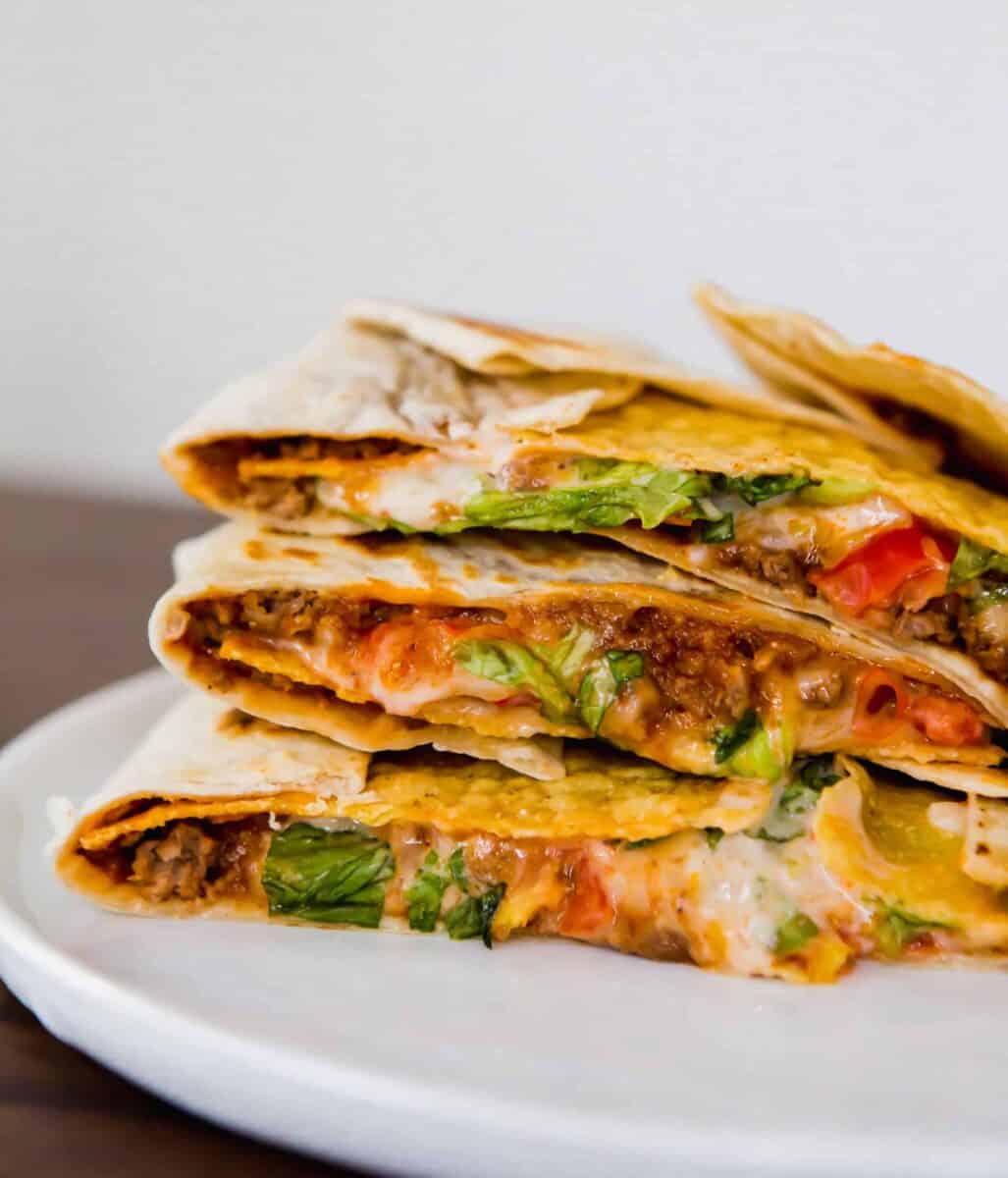 This homemade Crunchwrap Supreme recipe is going to satisfy all your Taco Bell cravings! It's filled with meaty, cheesy, crunchy goodness!