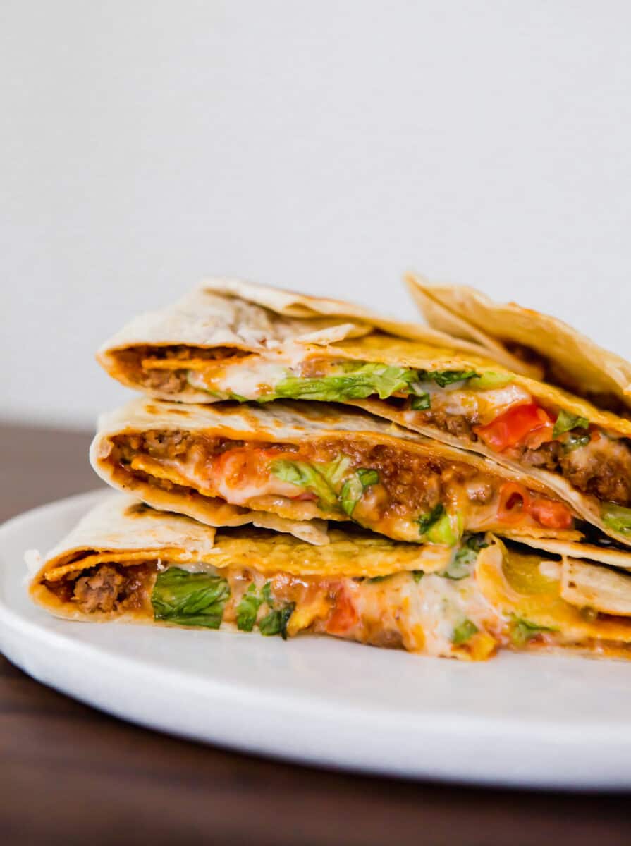 This homemade Crunchwrap Supreme recipe is going to satisfy all your Taco Bell cravings! It's filled with meaty, cheesy, crunchy goodness!