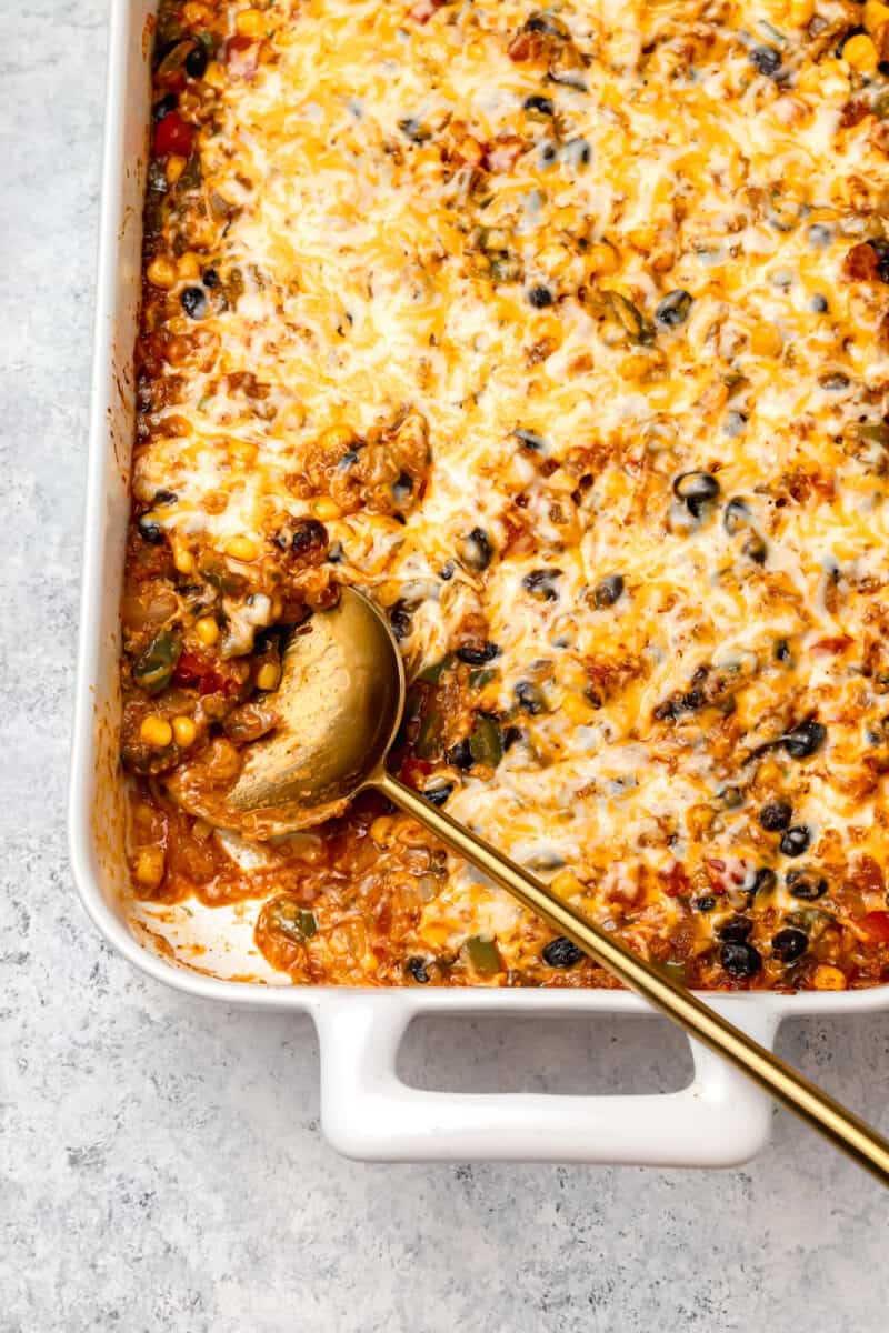 This quinoa enchilada bake makes dinner a breeze! It is full of flavor and comes together in no time!