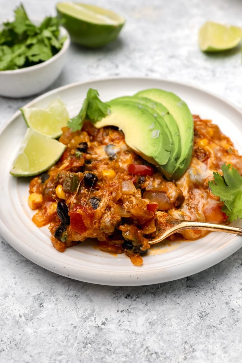 This quinoa enchilada bake makes dinner a breeze! It is full of flavor and comes together in no time!