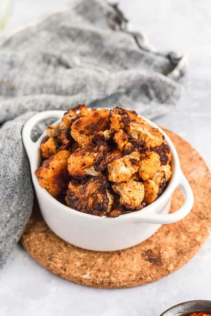 If there was ever a time to be obsessed with a vegetable, now is the time. Crazy roasted cauliflower is addicting AF and you seriously won't be able to get enough!