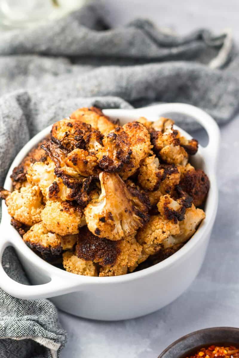 If there was ever a time to be obsessed with a vegetable, now is the time. Crazy roasted cauliflower is addicting AF and you seriously won't be able to get enough!