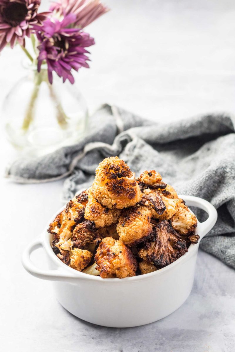 If there was ever a time to be obsessed with a vegetable, now is the time. Crazy roasted cauliflower is addicting AF and you seriously won't be able to get enough!