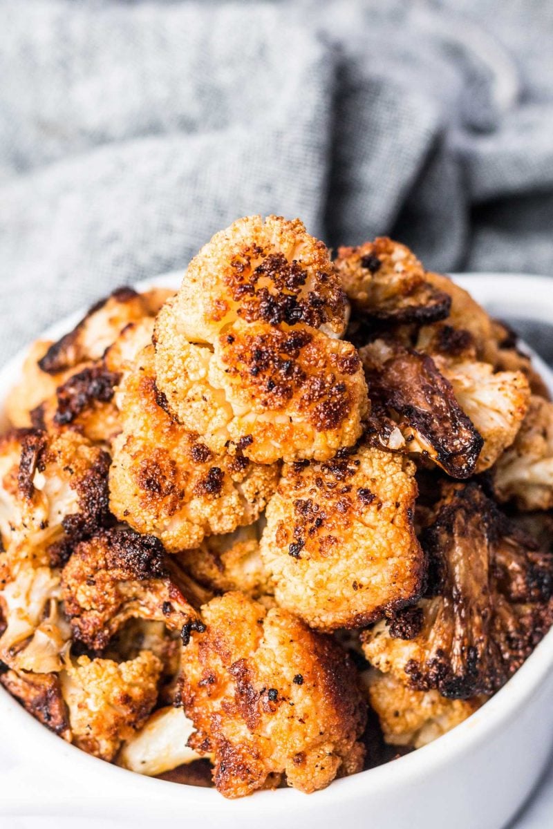 If there was ever a time to be obsessed with a vegetable, now is the time. Crazy roasted cauliflower is addicting AF and you seriously won't be able to get enough!