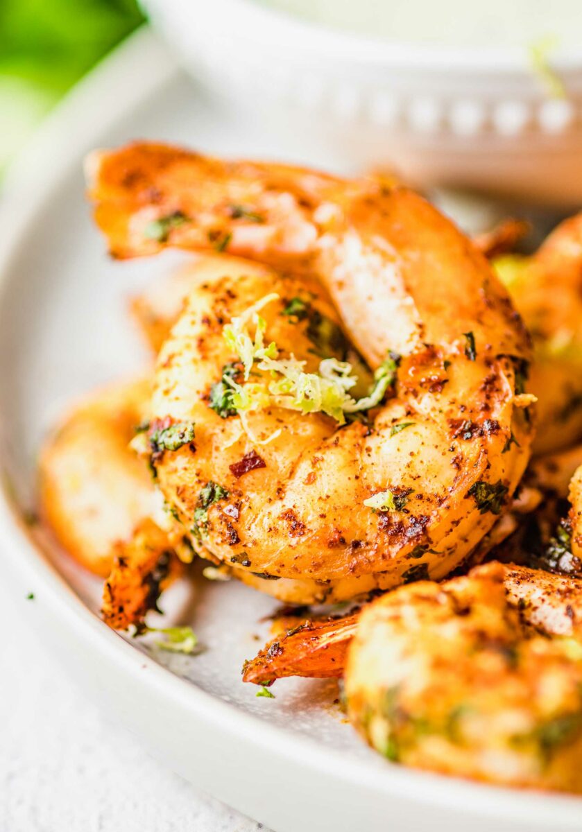 A close up image shows the details of a perfect cooked shrimp. 