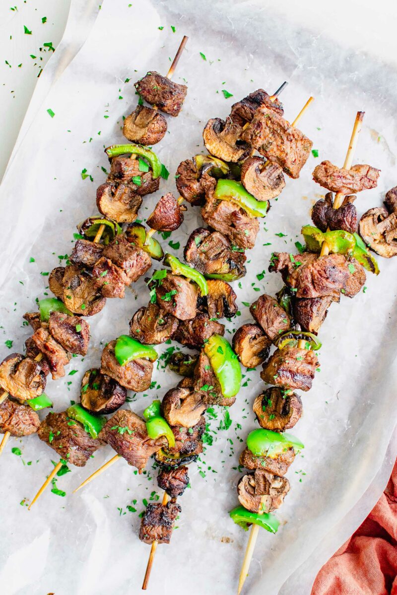 Grilled steak kebobs are fully cooked and ready to eat. 