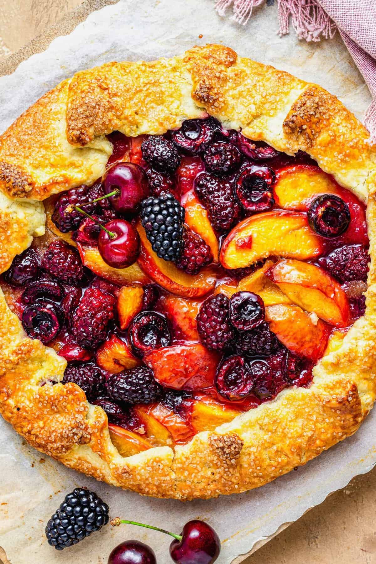 Stone fruits are baked into the center of a galette. 