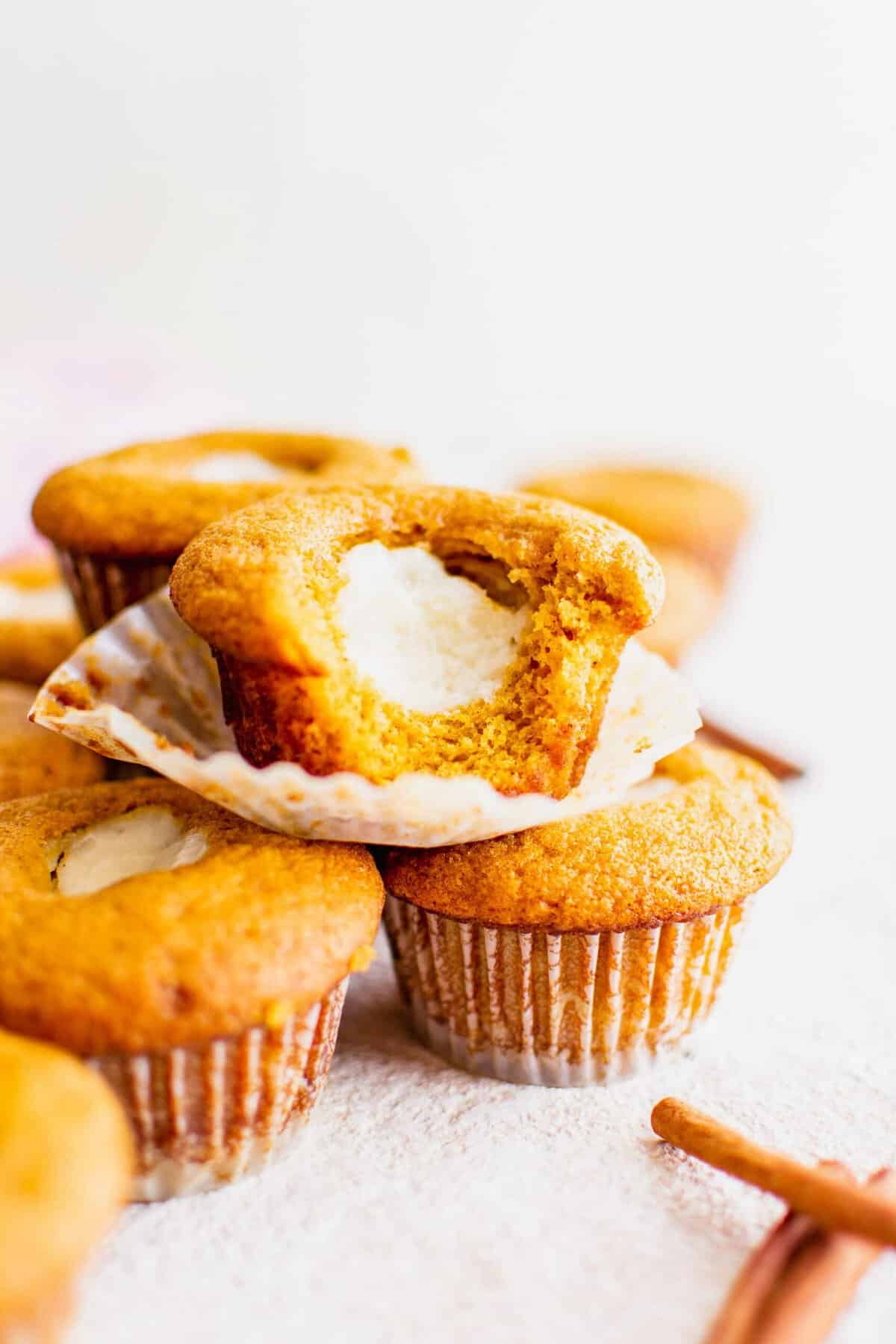 Several muffins are placed on top of one another. 