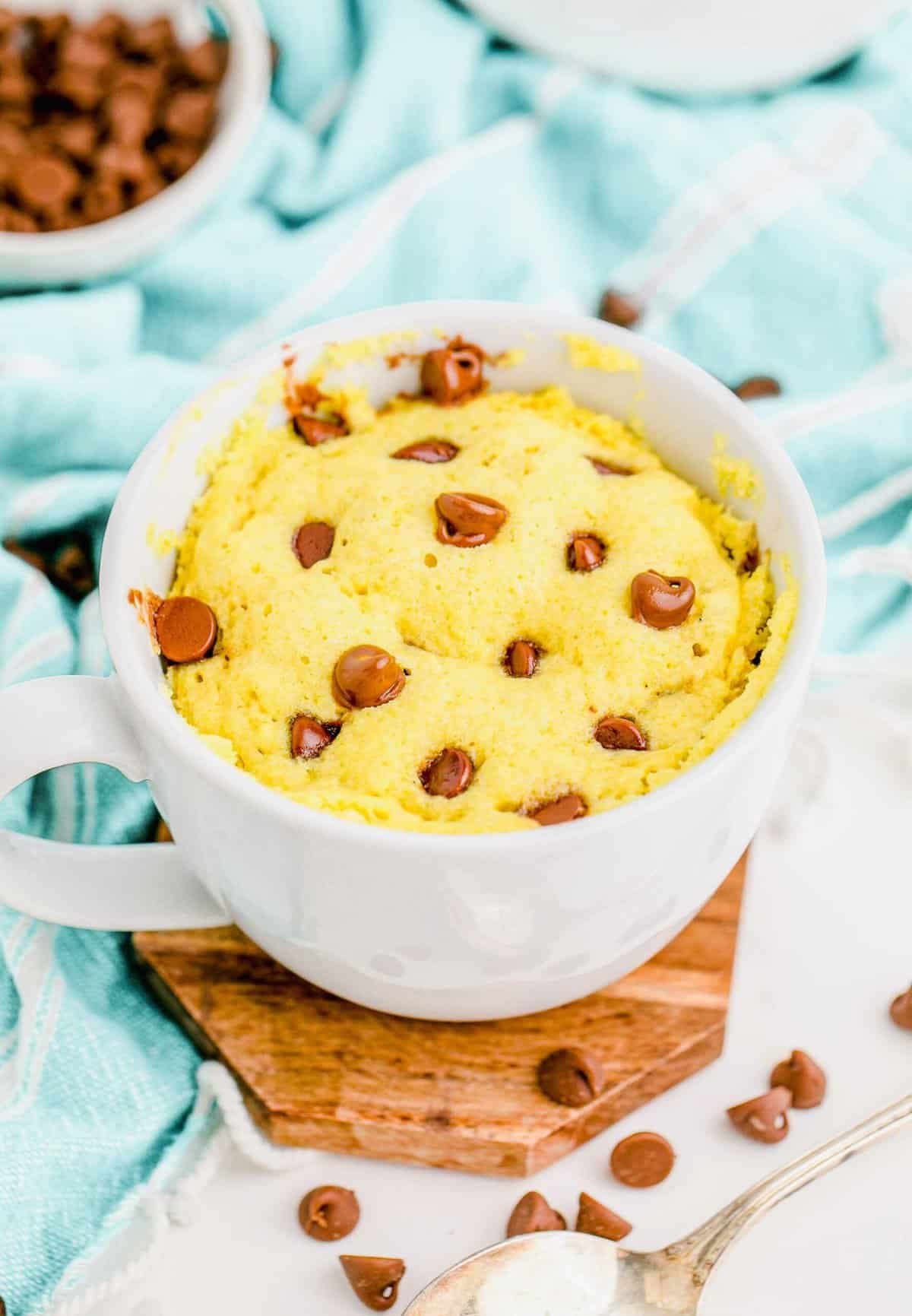 Chocolate chip mug cake in white mug