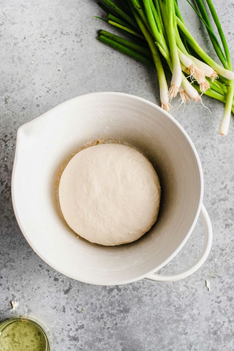 Overhead view of pancake dough ball in mixing bowl