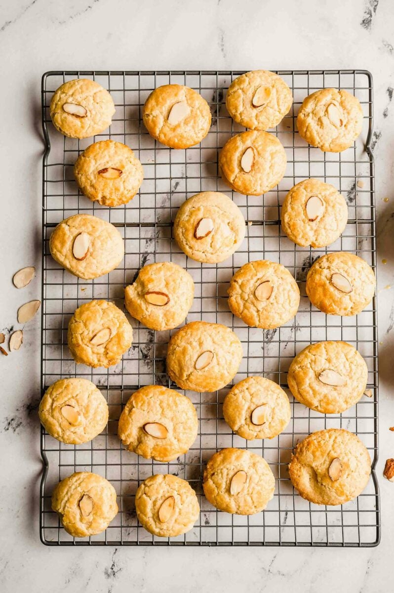 Overhead view of almond cookies on wire rack