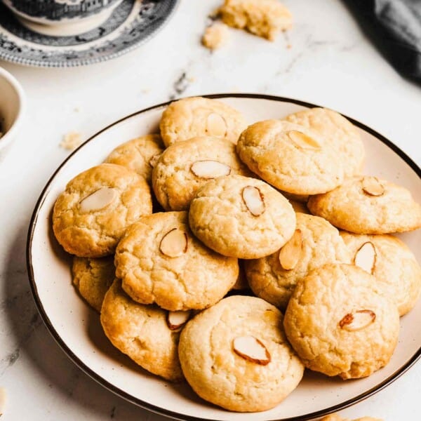 Chinese almond cookies stacked on plate