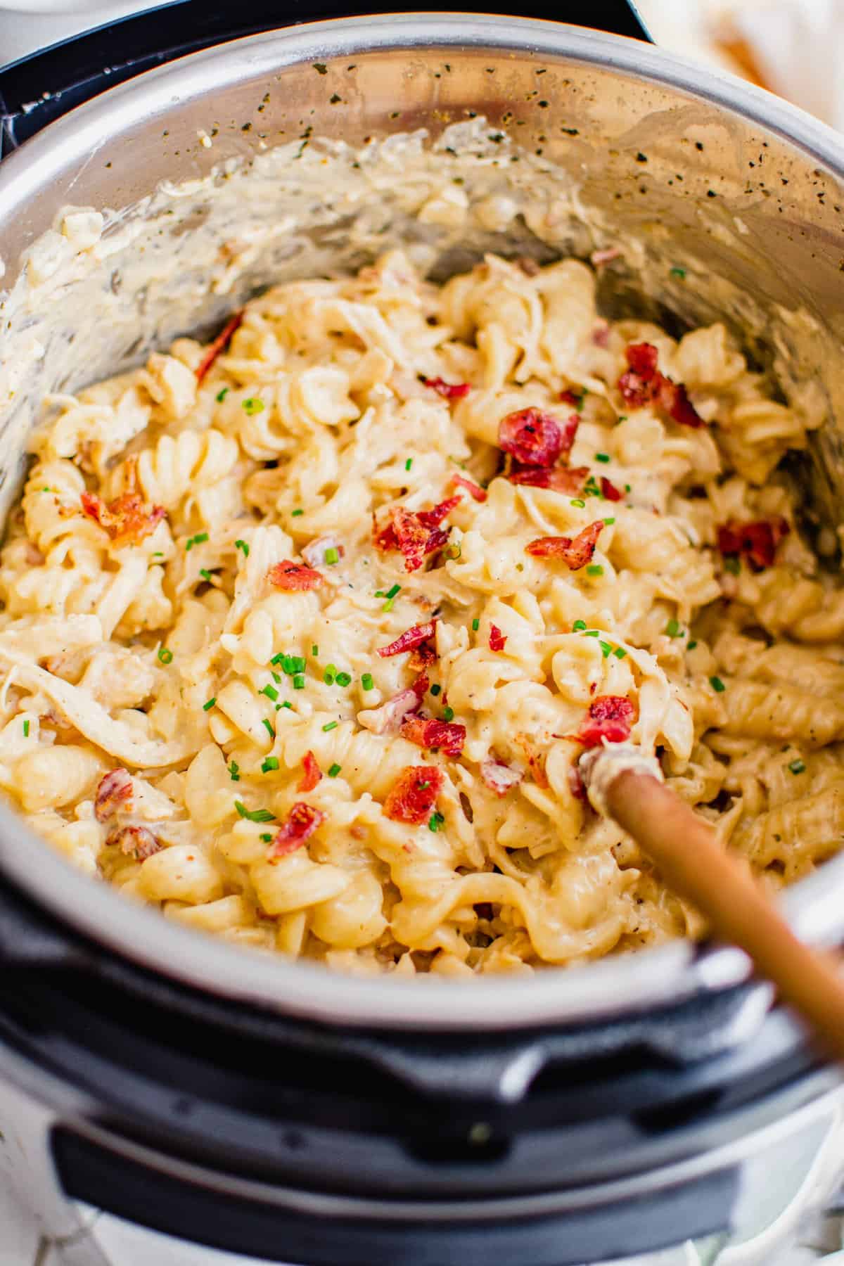 Overhead view of creamy chicken pasta in Instant Pot