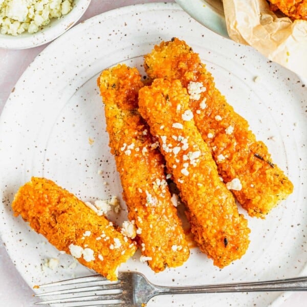 Crispy Buffalo Tofu fries on plate with fork