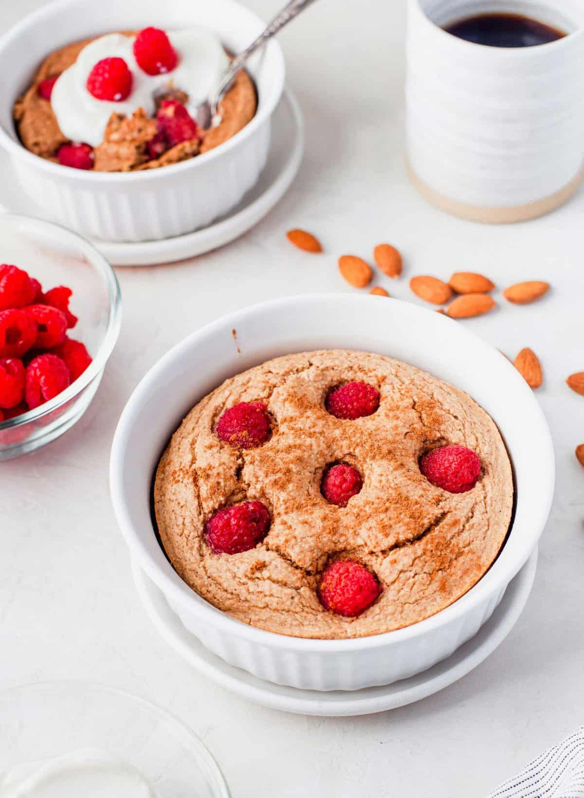 Raspberry baked oatmeal in white bowl