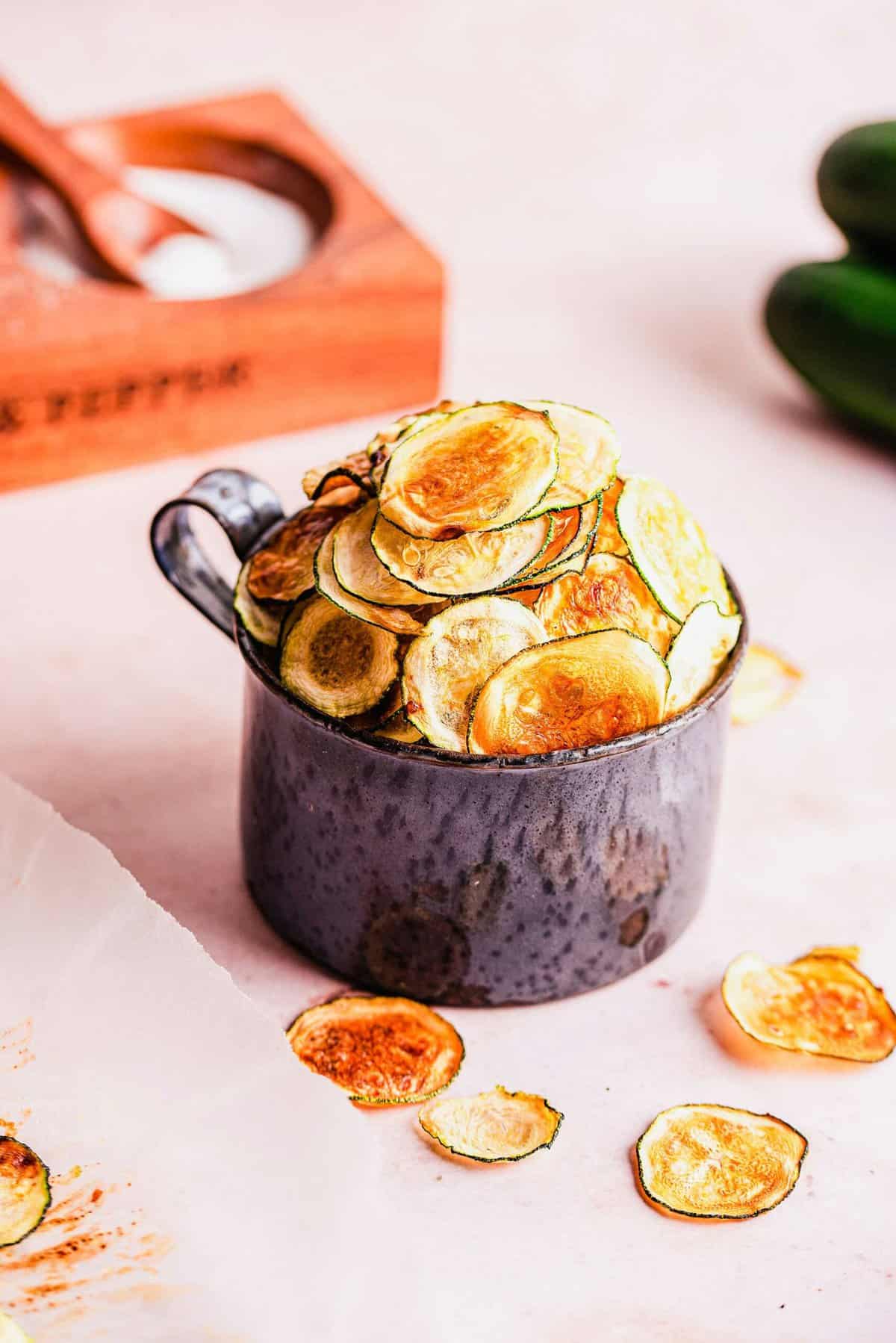 Small crock full of zucchini chips