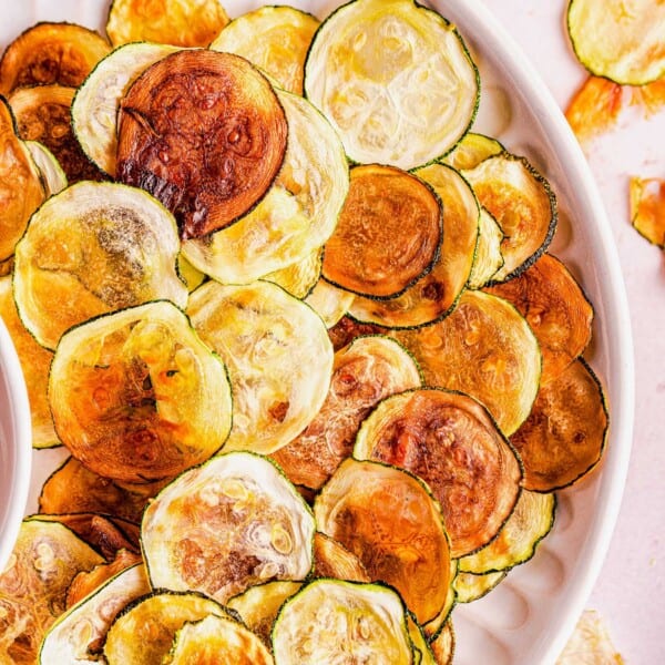 Zucchini chips on white plate