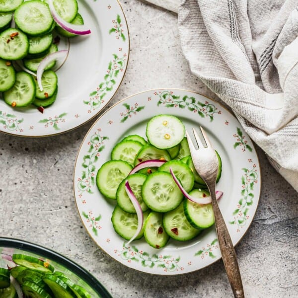 Overhead view of cucumber salad on plates