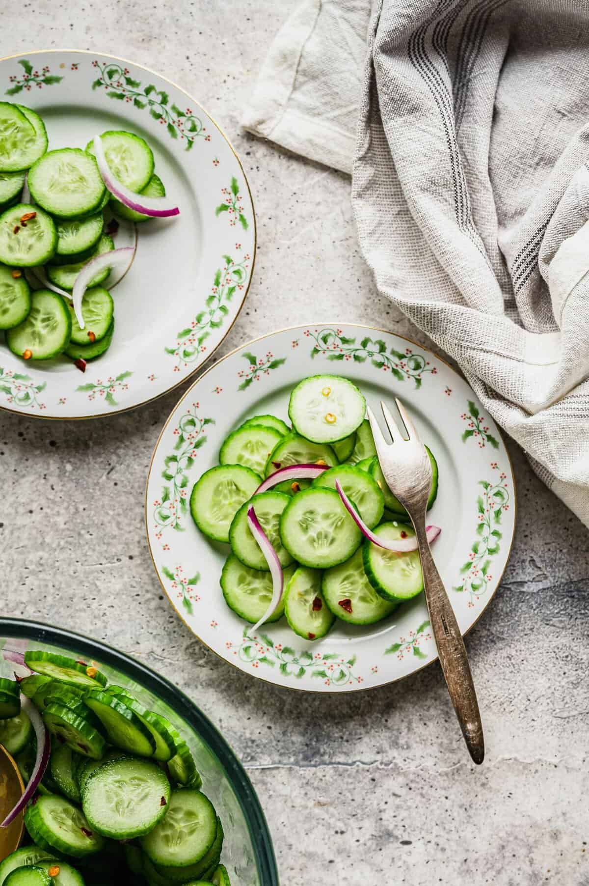 Overhead view of cucumber salad on plates