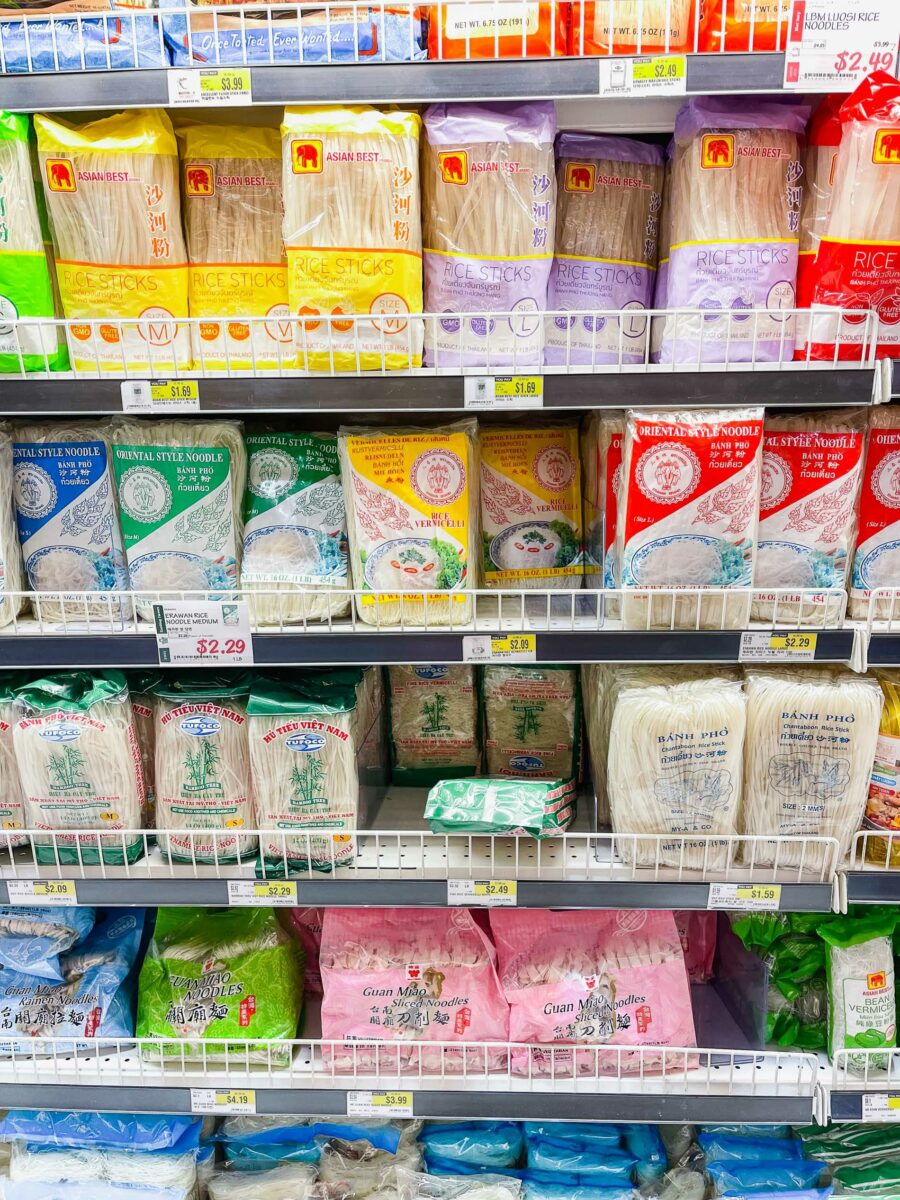 a photograph at the asian grocery store of the rice noodles on shelves