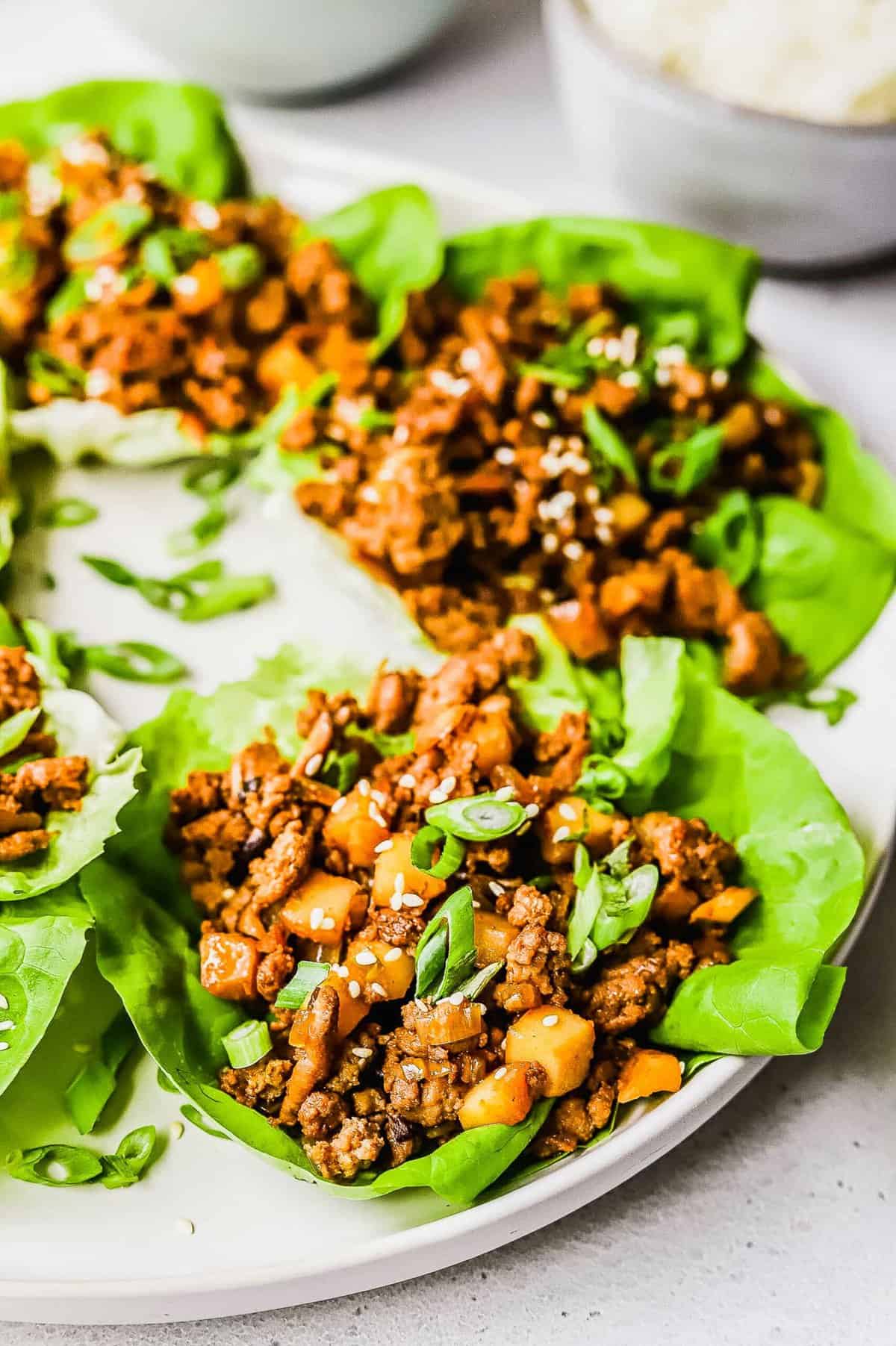 Lettuce wraps with ground chicken, mushrooms, and water chestnuts.