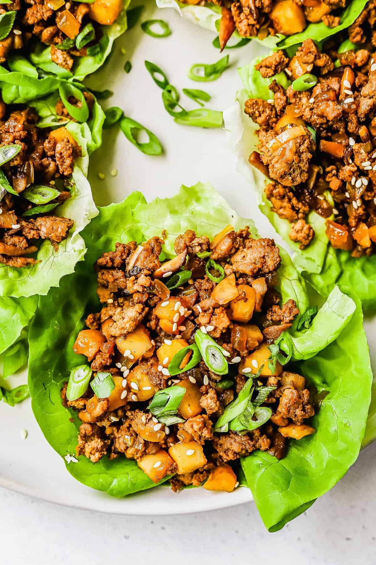 Chicken lettuce wraps with water chestnuts, ground chicken, and shiitake mushrooms.