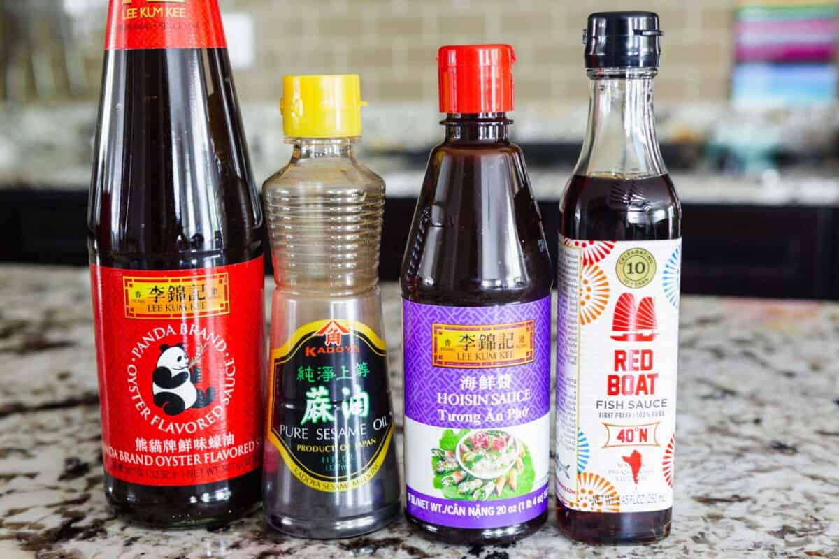 photo of oyster sauce, sesame oil, hoisin sauce, and fish sauce