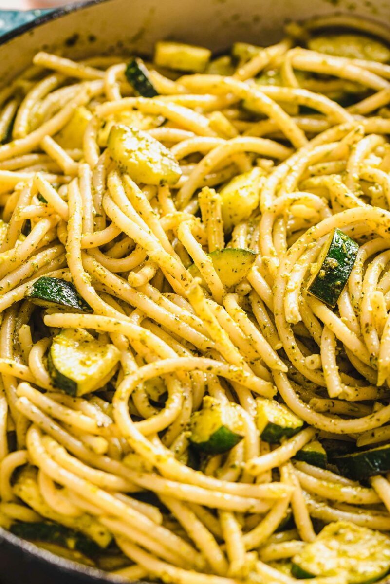 Chopped zucchini is spread throughout the creamy pasta dish. 
