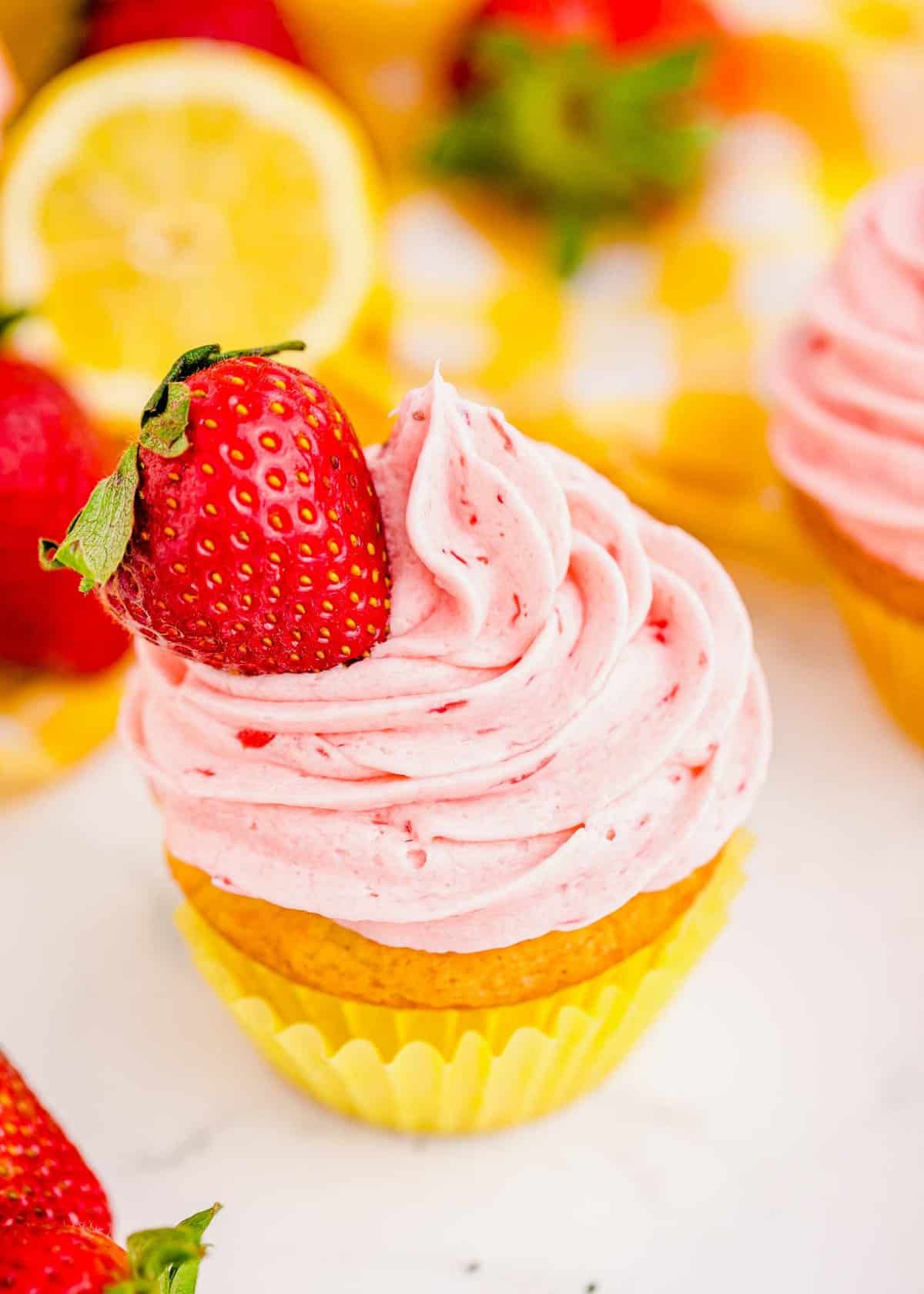 Strawberry lemonade cupcake topped with fresh strawberry