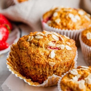Strawberry oatmeal breakfast muffin with loosened wrapper