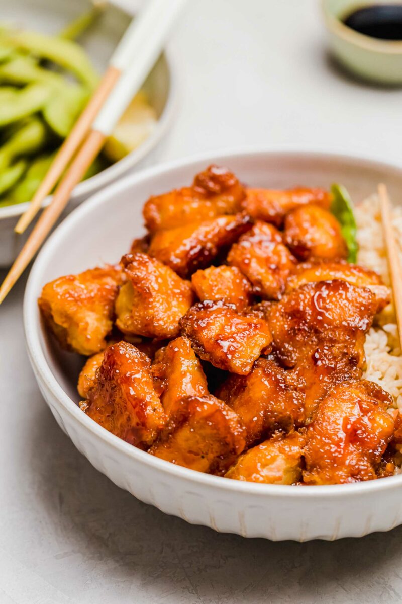 a large bowl of sweet and sour chicken