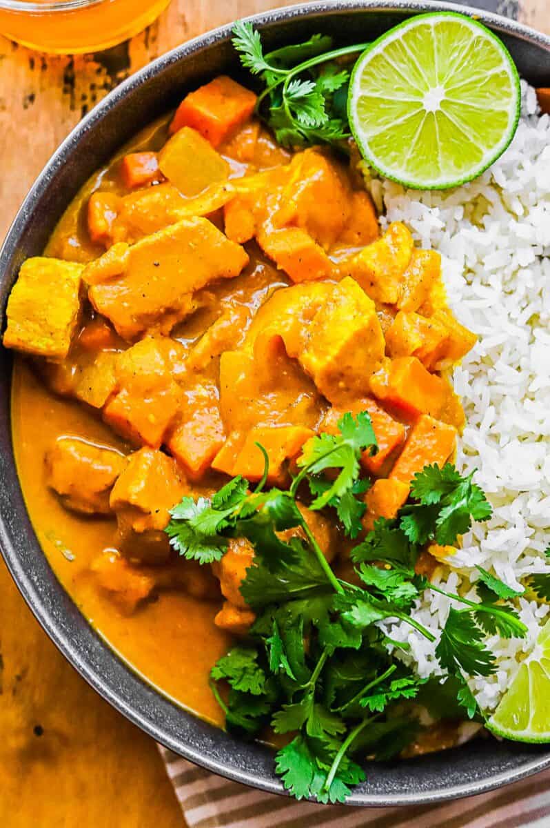 Cilantro garnishes pumpkin curry and rice.