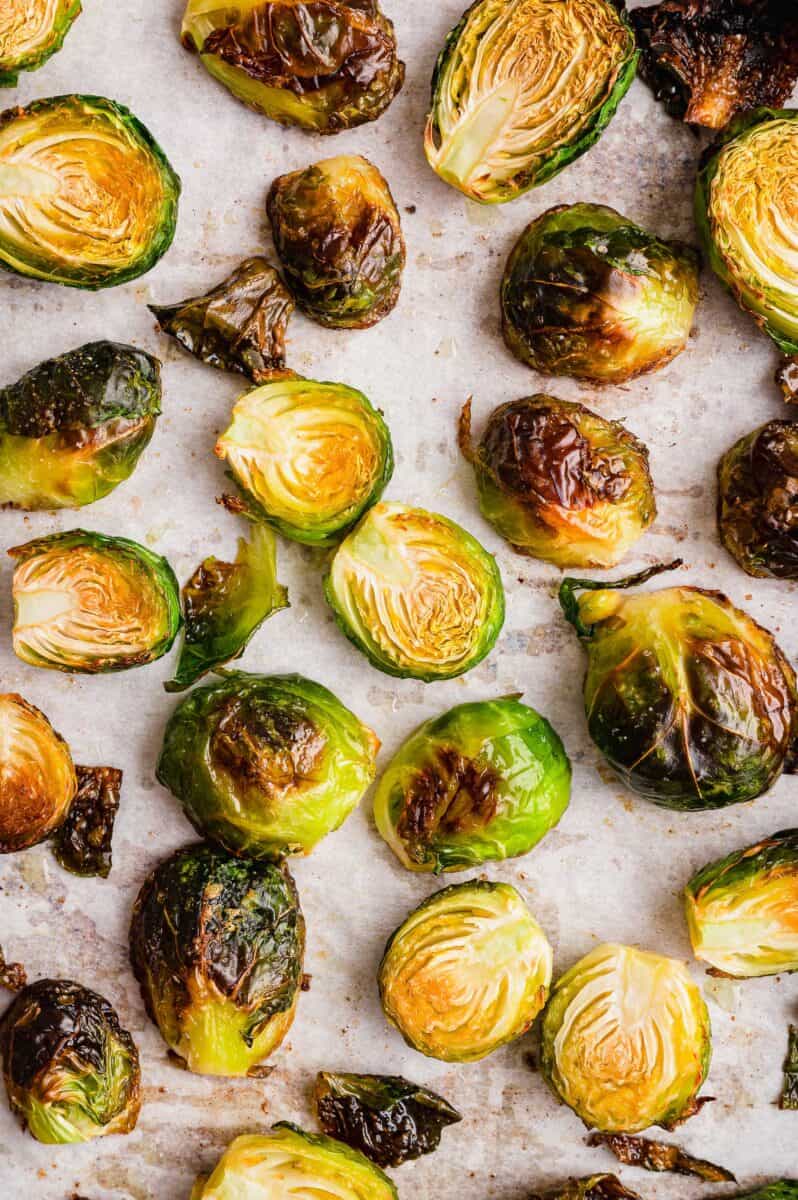 up close image of roasted brussels sprouts. there is distinct browned exterior