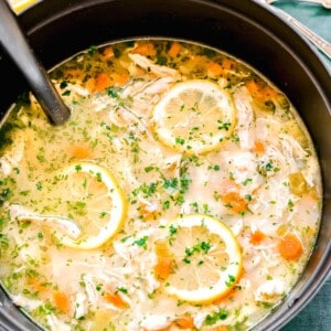 overhead shot of lemon chicken and rice soup in a large pot