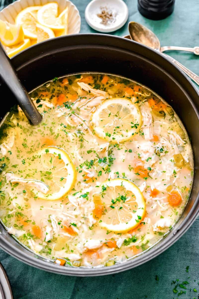 overhead shot of lemon chicken and rice soup in a large pot