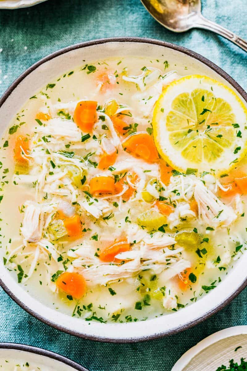 up close and overhead shot of the lemon chicken and rice soup in a bowl