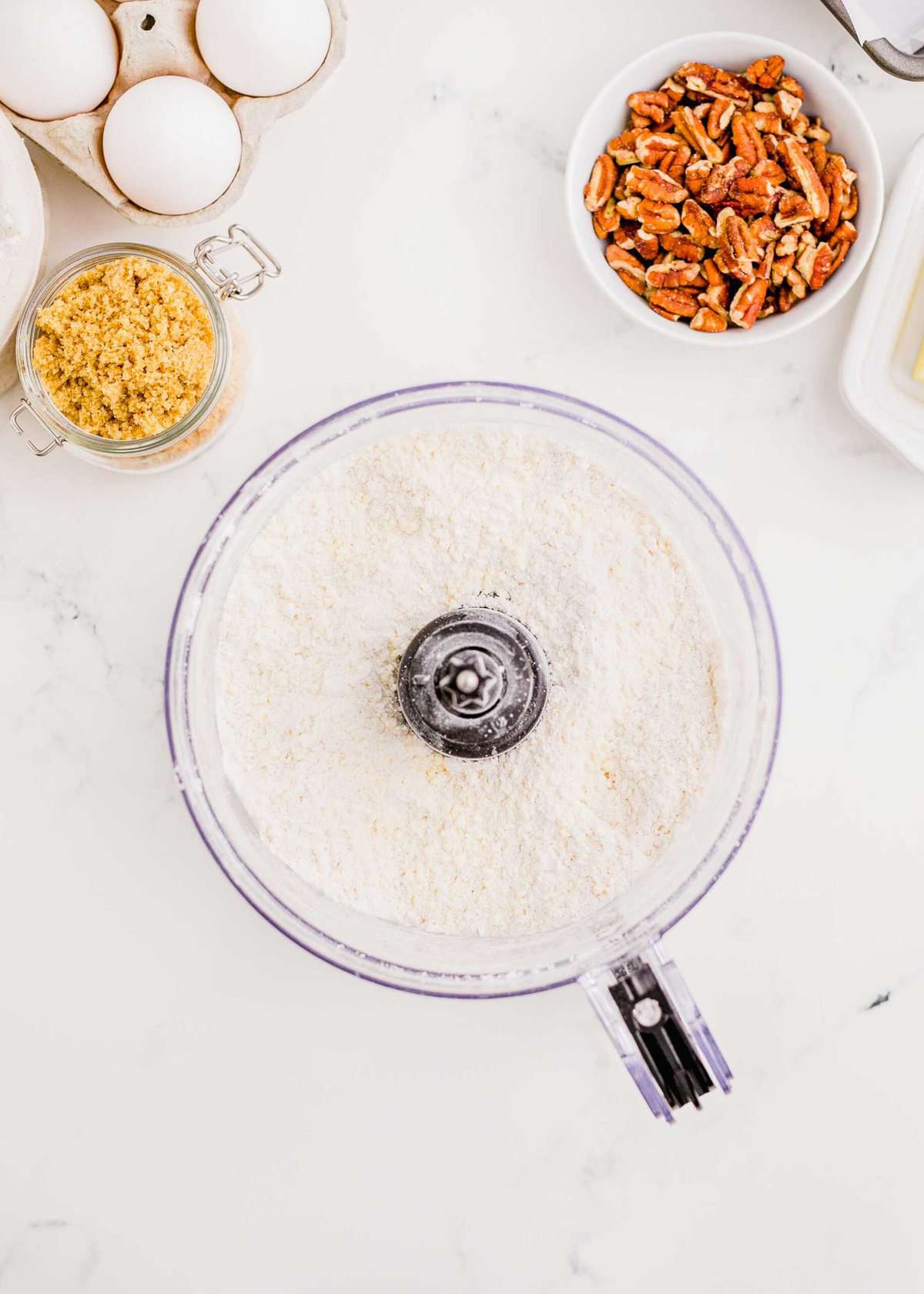pulsed butter, flour, and powdered sugar in a food processor