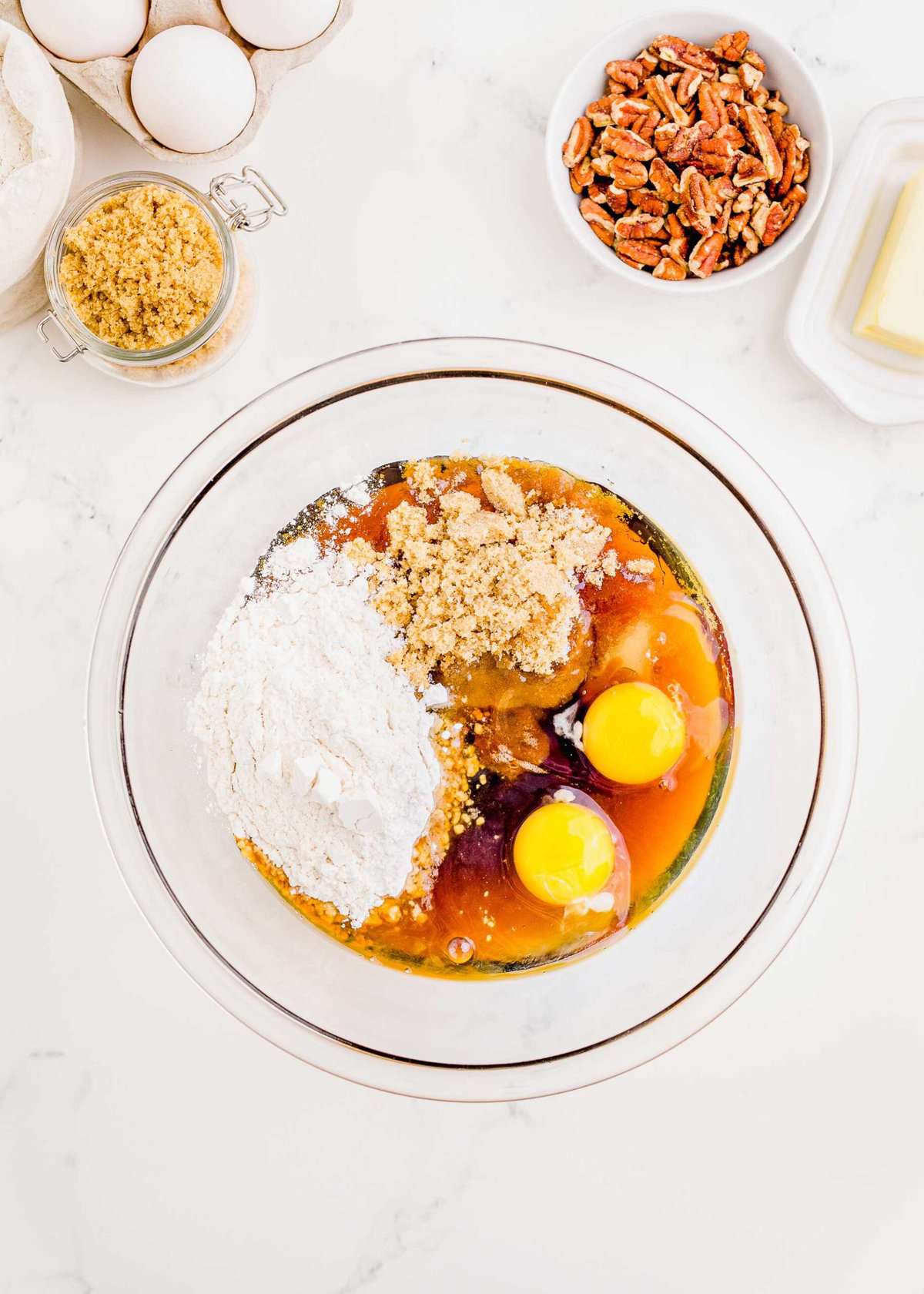 filling ingredients in a clear bowl