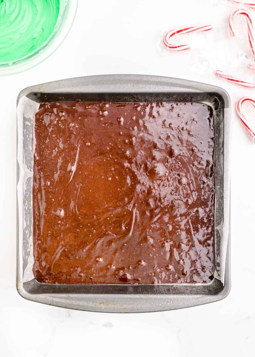 brownie batter in a 9x9 baking pan