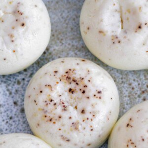 up close image of egg white bites with black pepper spots on top