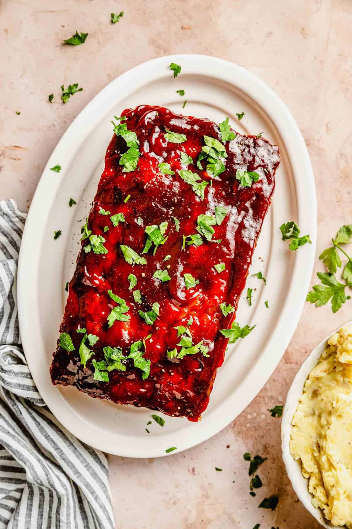 Classic meatloaf on. plate ready to be enjoyed.