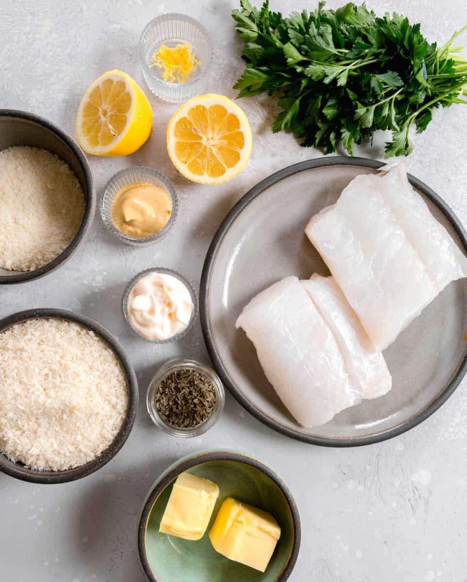 ingredients for panko parmesan baked cod: lemon, fresh parsley, cod, butter, dried basil, panko, mayo, dijon mustard, parmesan cheese