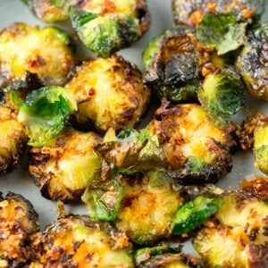 garlic chili crisp oil on top of crispy smashed brussels sprouts